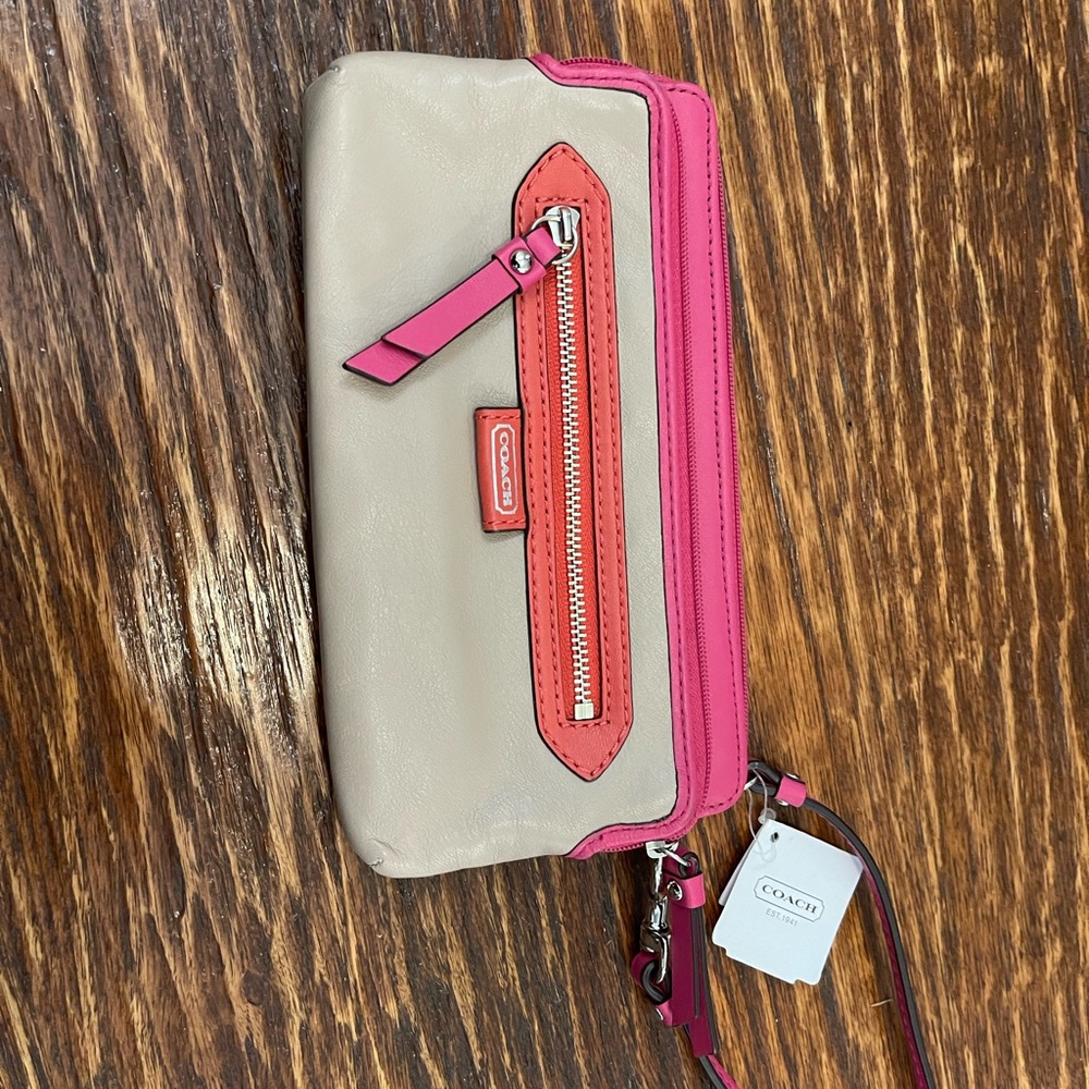 Coach wristlet tan and pink